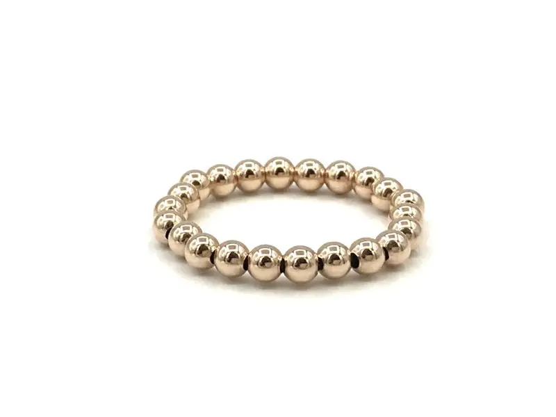 Stretch basis ring Noémi met rosé real gold plated balletjes
