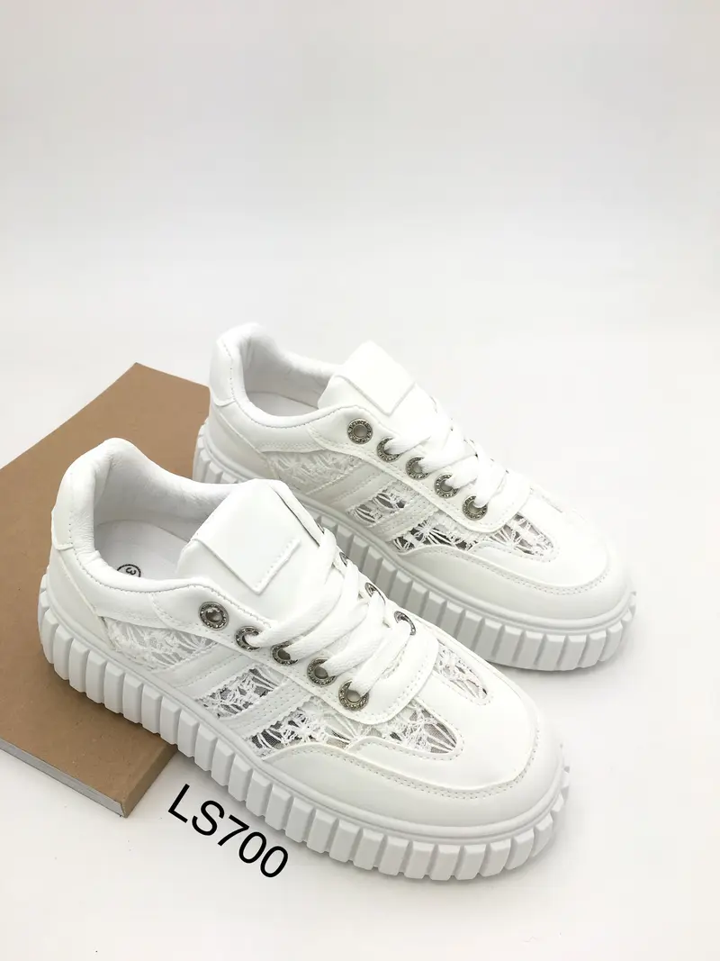 Tiny White Sneaker